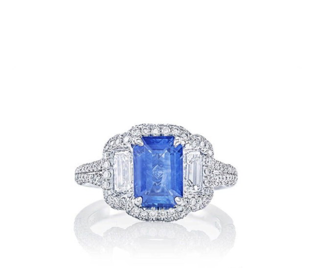 JB Star Platinum Ring, Featuring a 2.10ct Emerald Cut Blue Sapphire, Accented with 2 Emerald Cut Diamonds and Pave Set Round Diamonds =1.88ctw, G Color, VS Clarity | Alson Jewelers