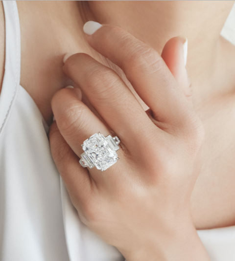 An impressive radiant cut three stone engagement rings An impressive radiant cut three stone engagement rings