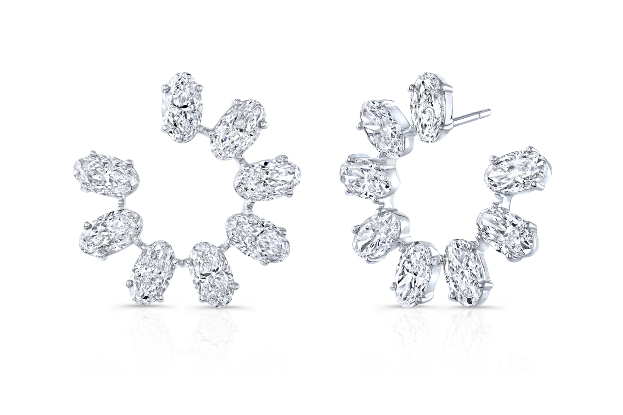 A distinctive pair of white gold Rahaminov earrings featuring oval cut diamonds, available at Alson Jewelers. A distinctive pair of white gold Rahaminov earrings featuring oval cut diamonds, available at Alson Jewelers.