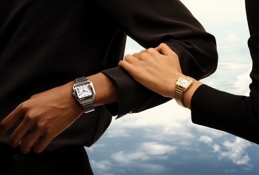 man and woman hands wearing watches