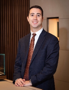 a picture of Matthew Schreibman in suit